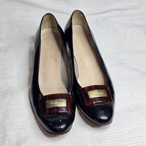 Salvatore Ferragamo Black Patent Leather Flats with Gold Accents